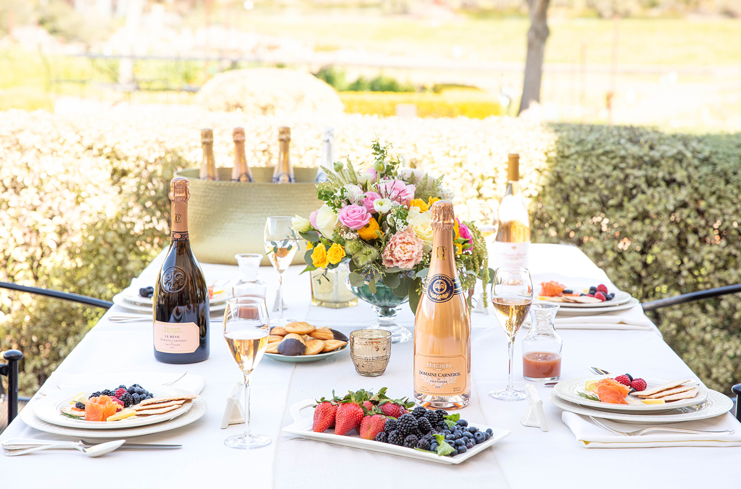 table set with brunch items and wine