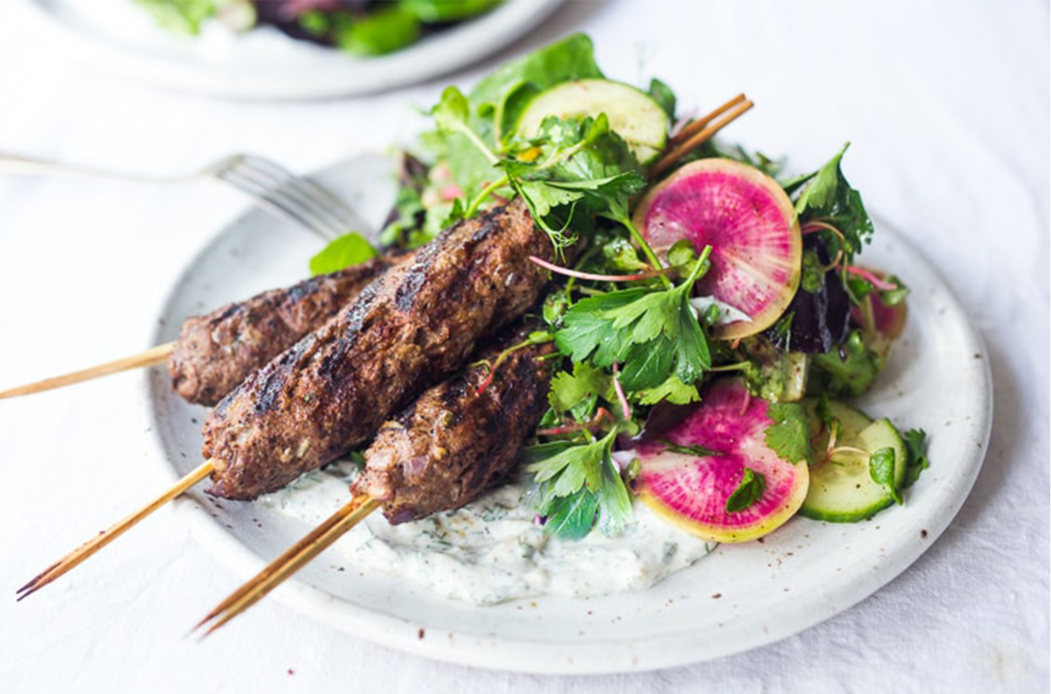 Grilled Lamb Kebabs with Herb Salad and Yogurt Sauce