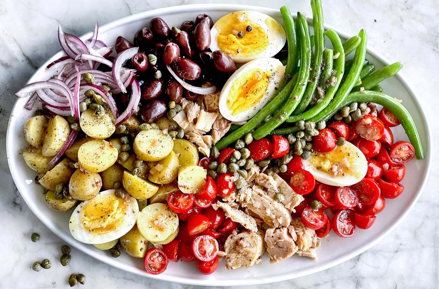 bowl display of Niçoise salad