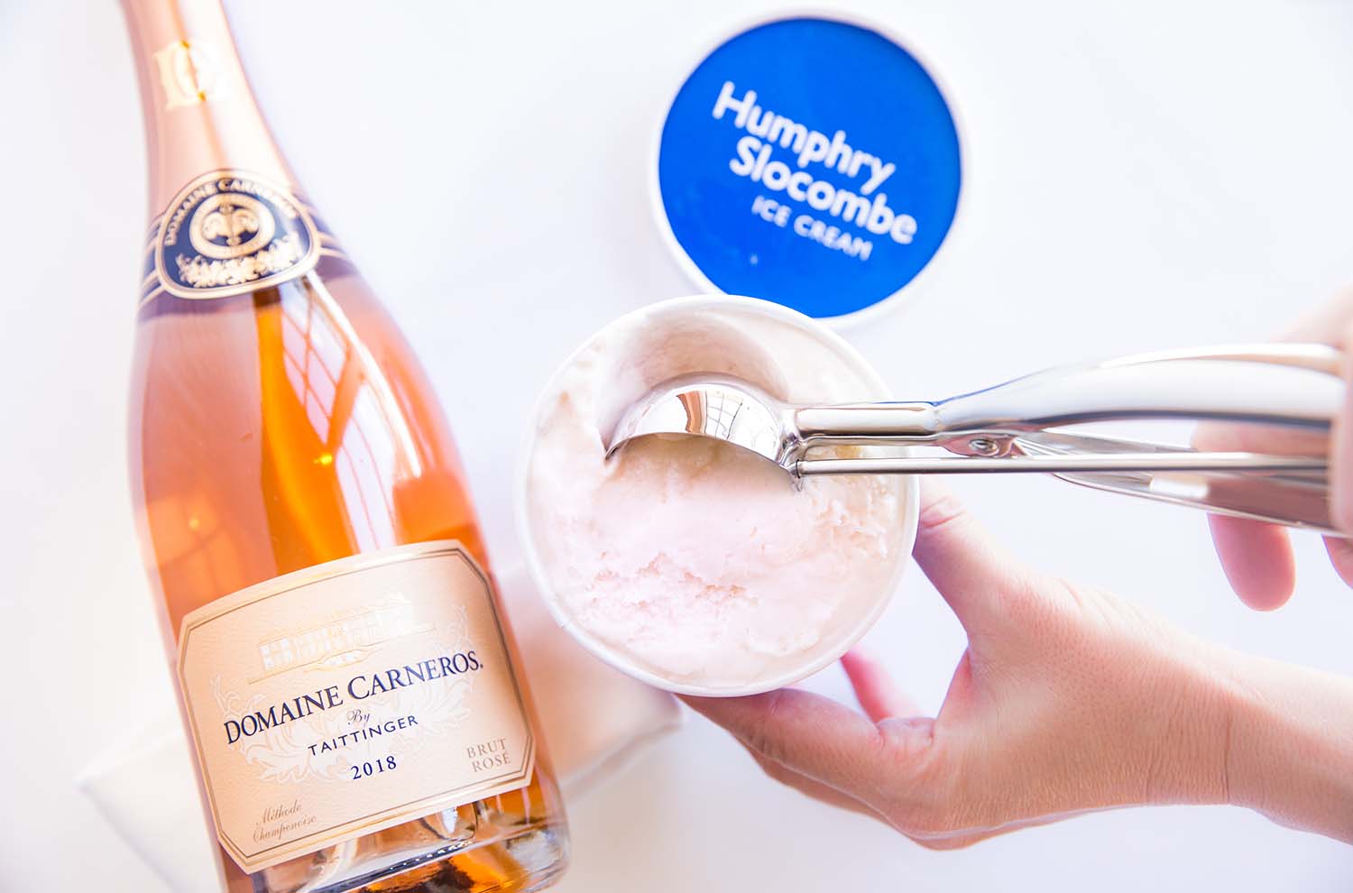 Bottle of 2018 Brut Rose and Humphry Slocombe ice cream with scooper