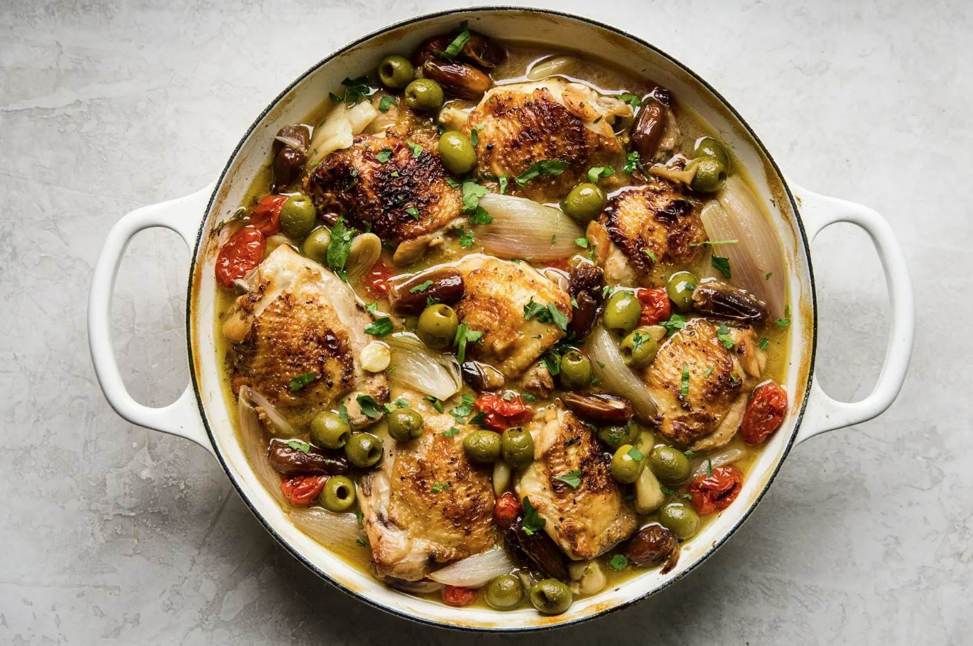 Chicken Provençal in an iron dish.