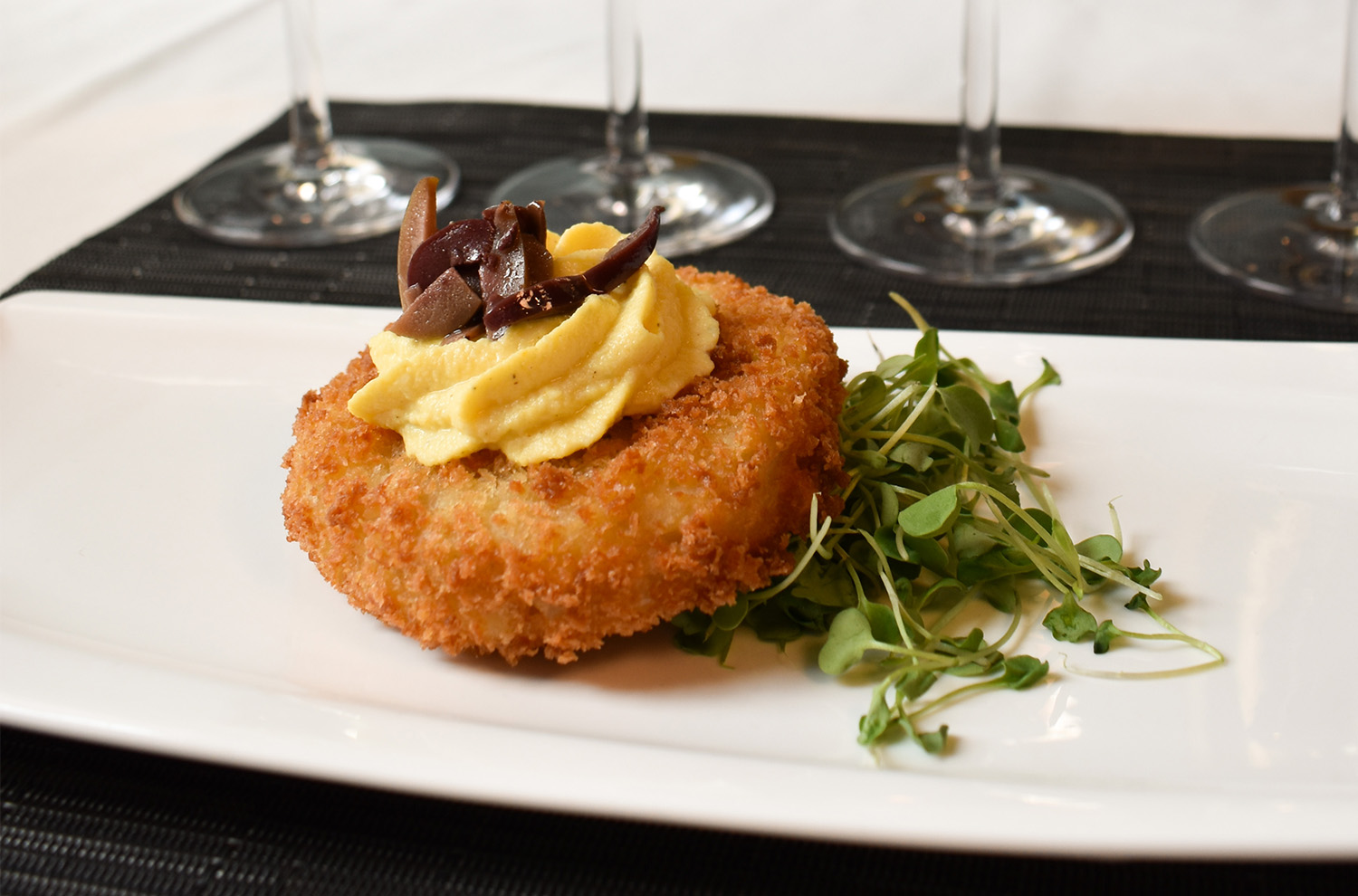 potato croquette topped with egg mouse
