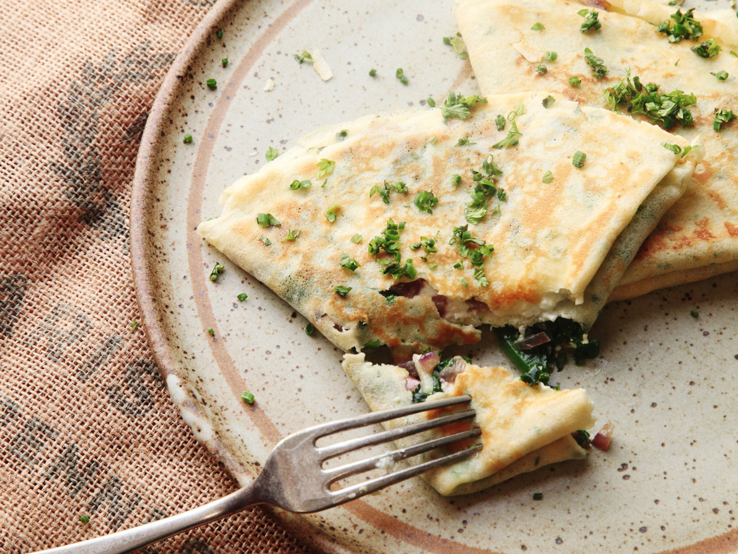 Classic Crêpes with Wagon Wheel Cheese, Caramelized Onion, and Applewood Bacon 